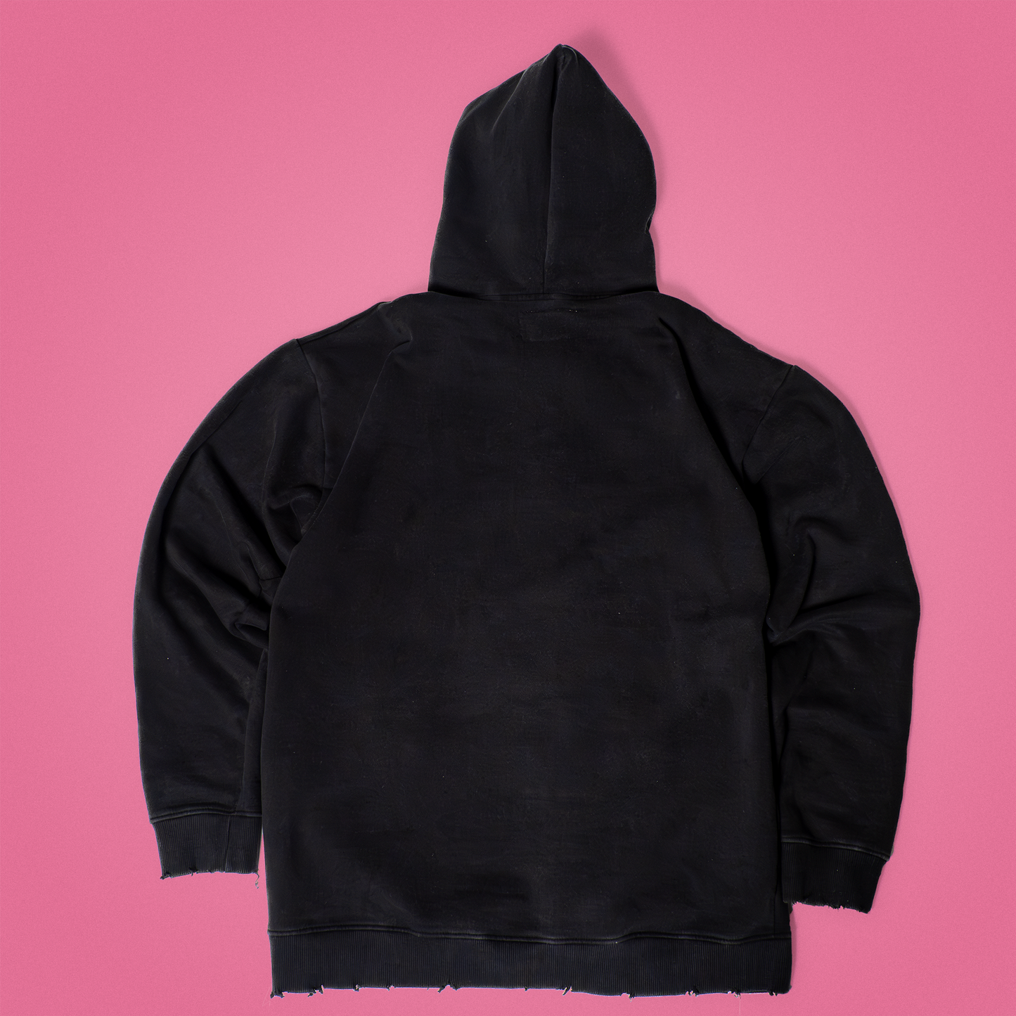 The back of the "digital_toxicity" Dark Gray Acid Wash PATCH Hoodie features a washed-out, stormy texture that gives it a worn-in, dystopian vibe perfectly matching its chaotic name. A bold patch detail anchors the design, whispering rebellion with every thread.