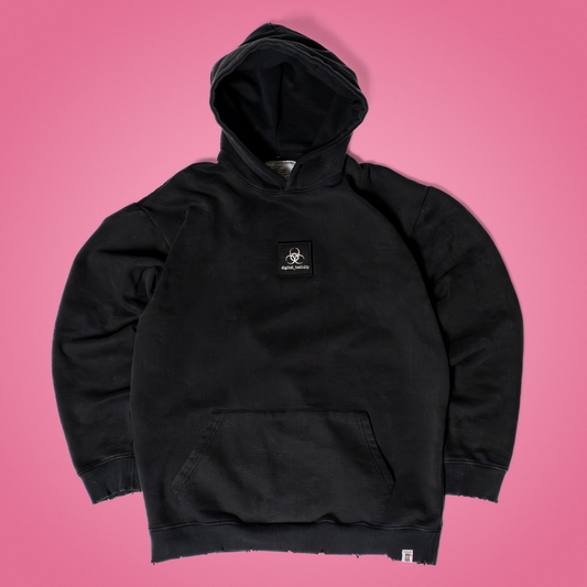 Dark gray acid wash hoodie featuring a ‘digital_toxicity’ patch on the chest, oversized fit with dropped shoulders and cozy fleece lining – glitchcore-inspired streetwear from Grater Things.