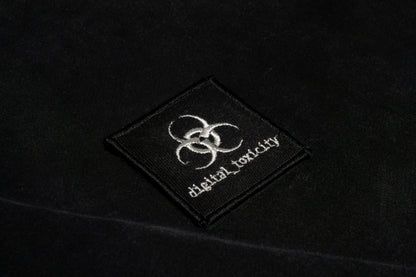 The digital_toxicity logo fuses glitchy edge with clean minimalism  a sharp, distorted typeface that looks like it's been pulled from a corrupted file, giving off major cyber-cheesecore energy. Bold, a little chaotic, and unmistakably wired.